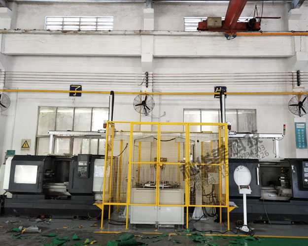 雙臂型數(shù)控機床機械手